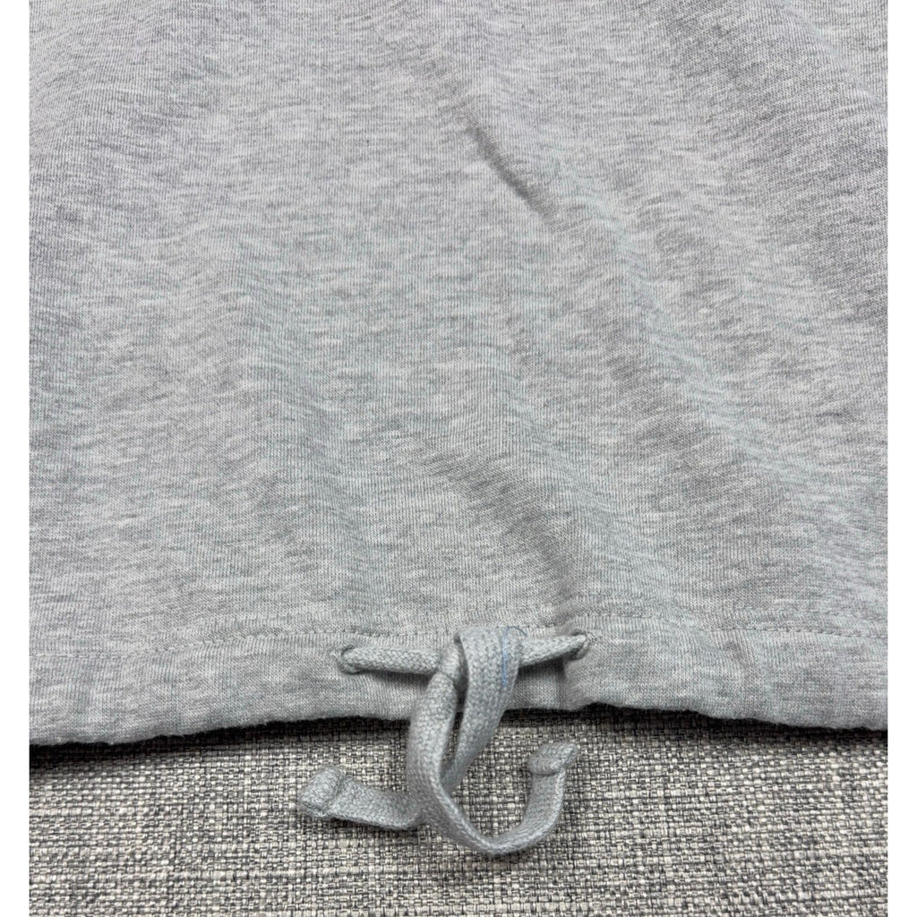 Second Half Supply Co, LLC heather gray cropped sweatshirt featuring an adjustable drawstring hem detail.
