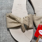 Havaianas You St Tropez Shine Bow Sandals Women 7/8 Beige Metallic NWT