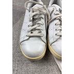 Second Half Supply Co, LLC white leather adidas Stan Smith sneakers with zebra print details and lace-up closure.