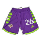 Second Half Supply Co, LLC purple and neon green Houston Dynamo soccer shorts with number 26 and Adidas branding.