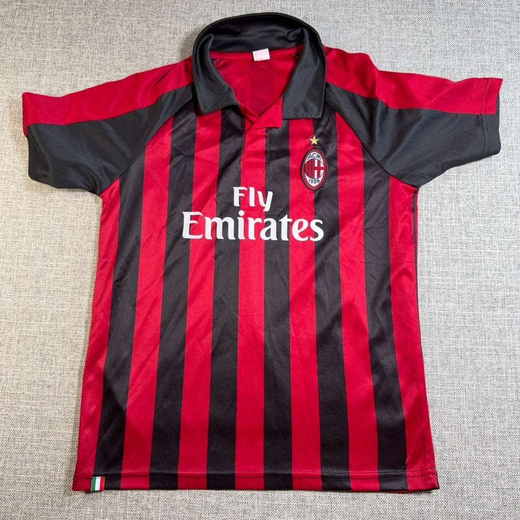 Second Half Supply Co, LLC youth AC Milan fan jersey with red and black stripes, collar, and Fly Emirates logo.