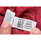 Second Half Supply Co, LLC adidas FC Dallas soccer shirt interior care tag with production date 12/15 and QR code