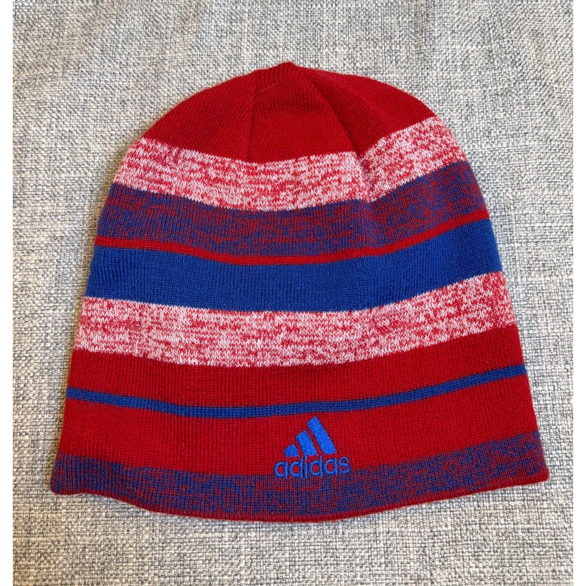 Second Half Supply Co, LLC adidas FC Dallas reversible knit winter beanie in red, blue, and white striped pattern.