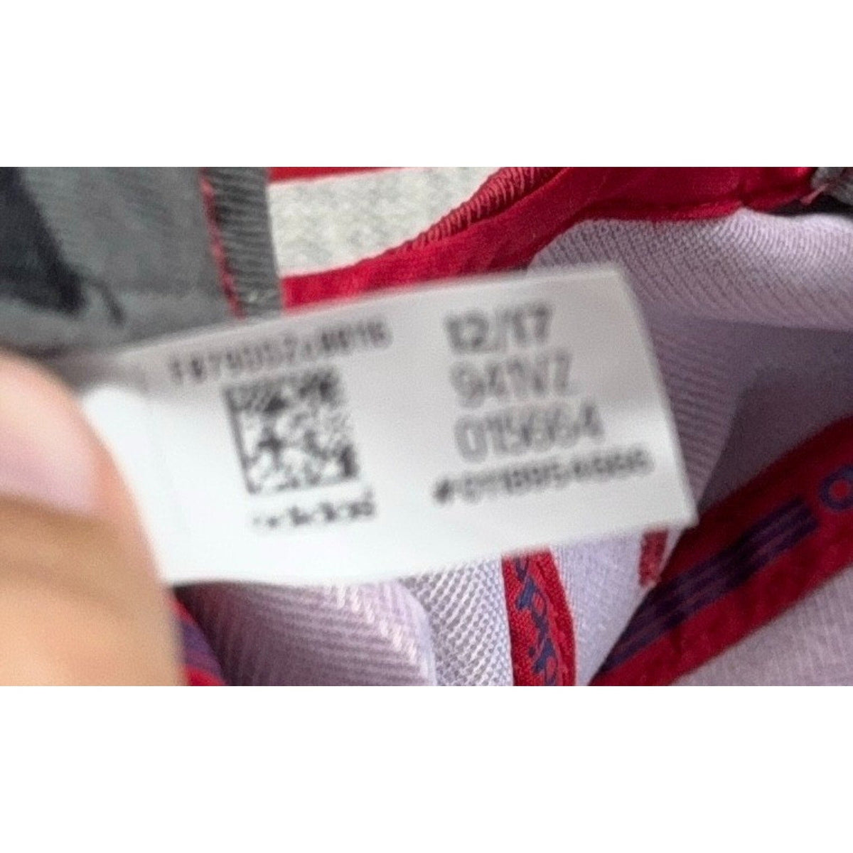 Second Half Supply Co, LLC Adidas Real Salt Lake hat interior care tag with manufacturing date and product details