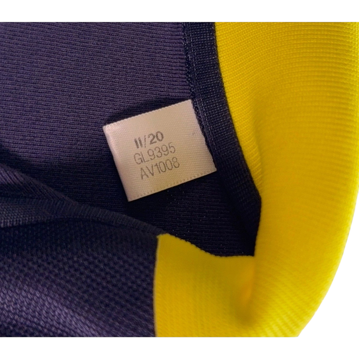 Second Half Supply Co, LLC Adidas Nashville SC jacket interior care tag with style code GL9395 and date code 11/20