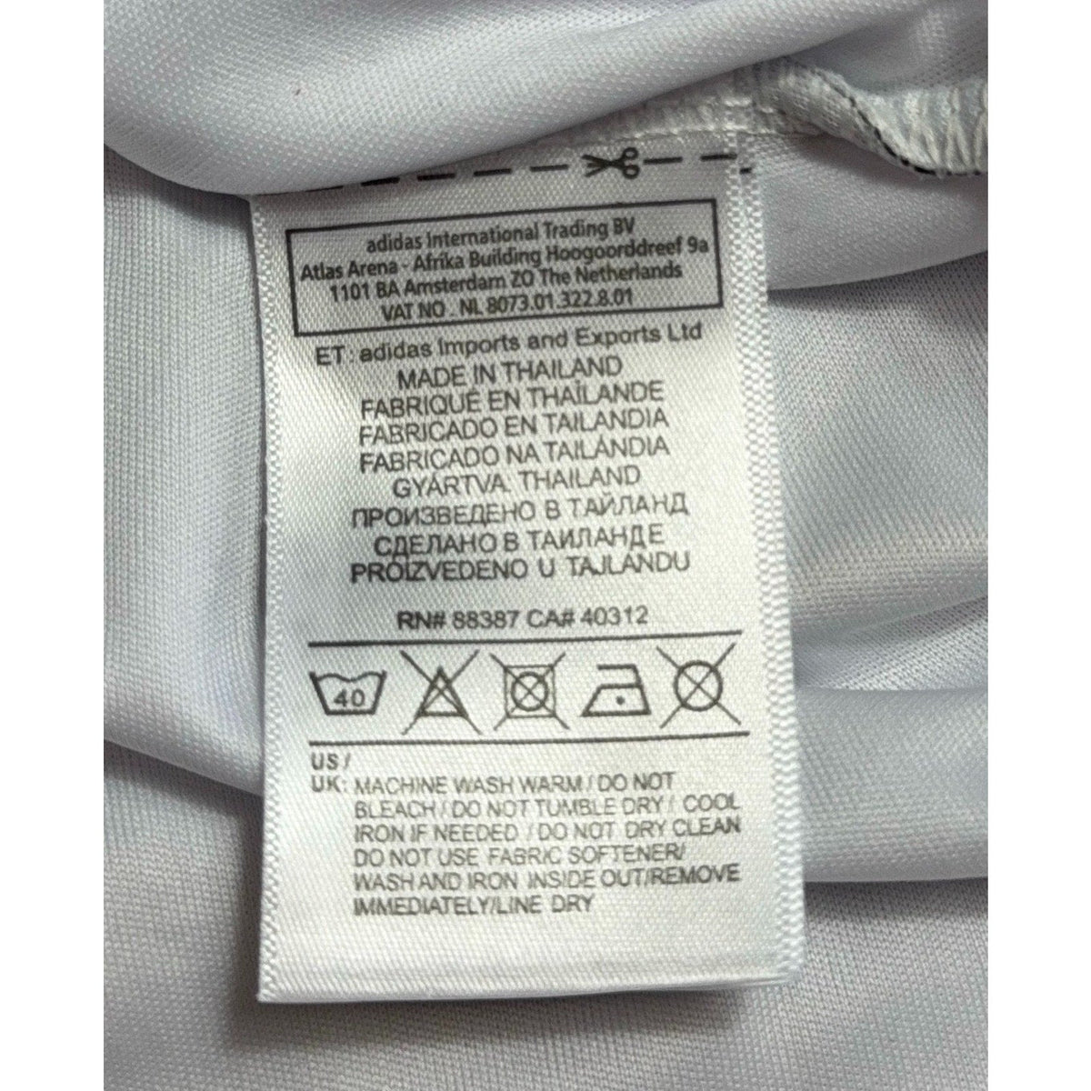 Second Half Supply Co, LLC Adidas Fulham FC jersey interior care label with washing instructions and origin details