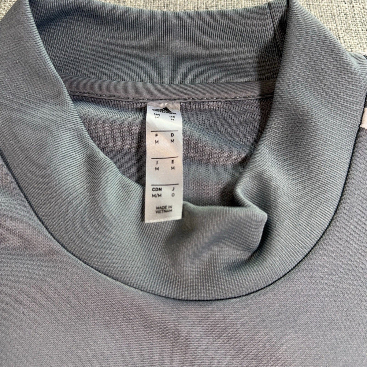 Second Half Supply Co, LLC gray Adidas LAFC training top inner neck label and collar detail