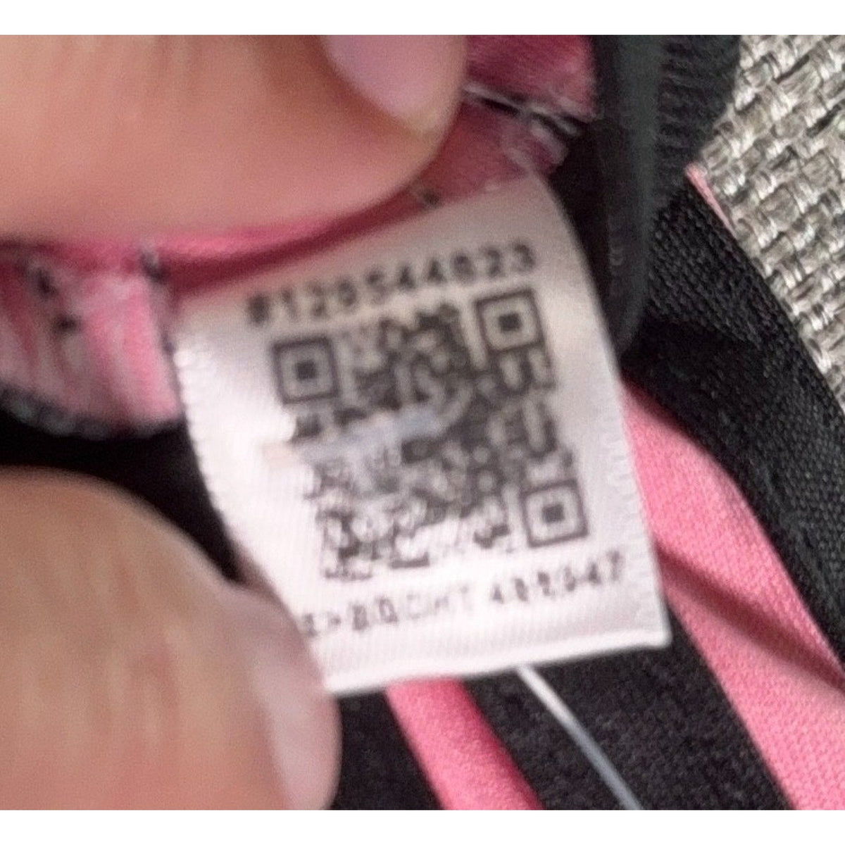 Second Half Supply Co, LLC Adidas Inter Miami Messi jersey inner QR code authenticity tag with pink and black fabric