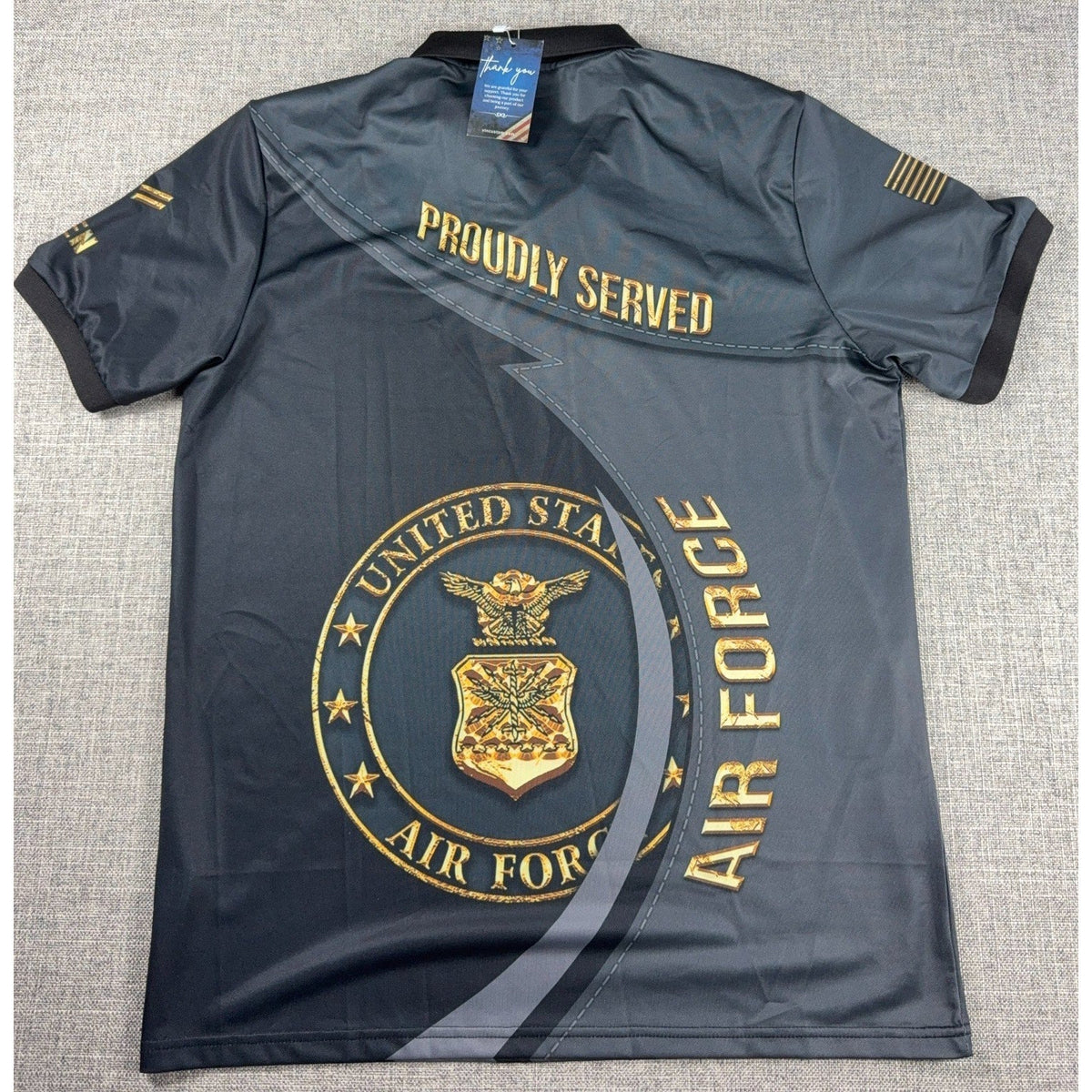 Second Half Supply Co, LLC black Air Force veteran polo shirt with gold emblem and Proudly Served graphic