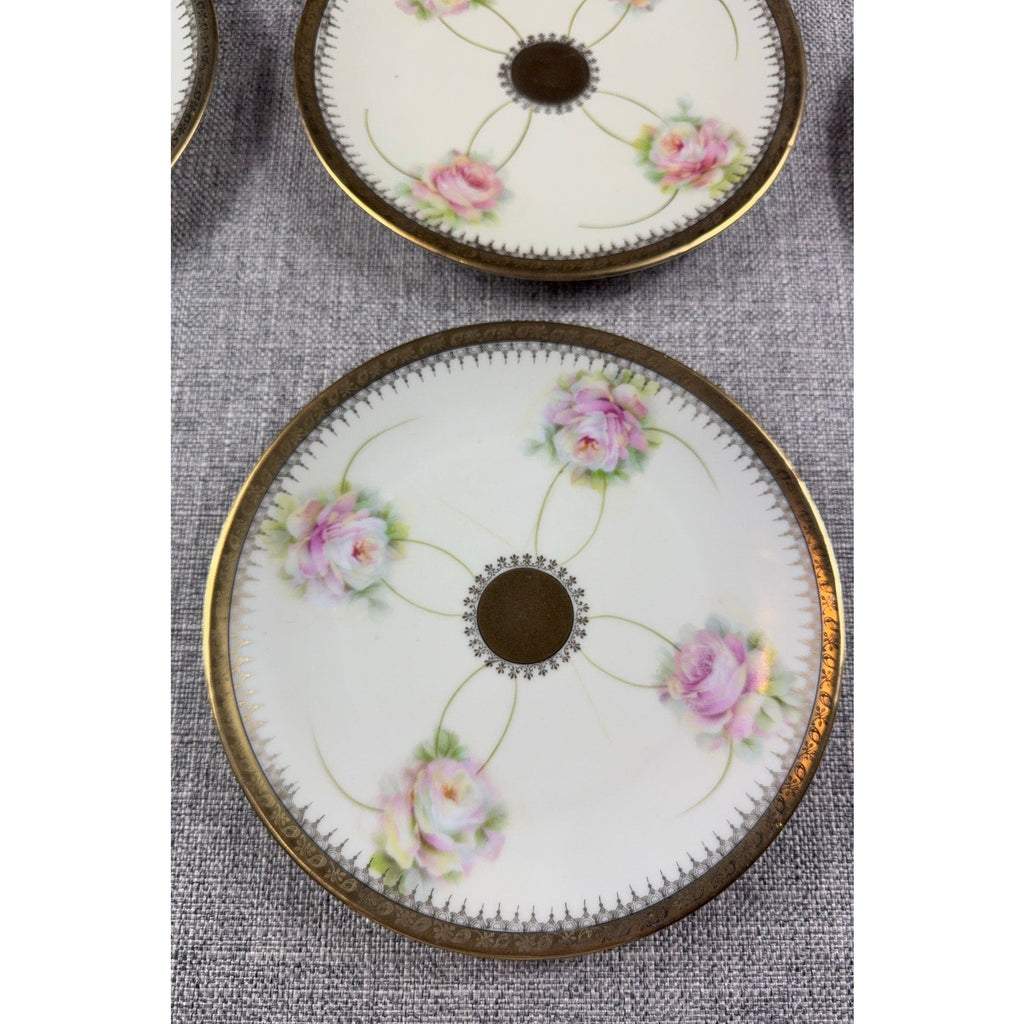 Second Half Supply Co, LLC antique PM Moschendorf Bavaria porcelain plates with hand-painted roses and gold rims.
