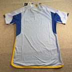 Back view of Second Half Supply Co, LLC Atlanta United FC 2024/25 away jersey in light blue with yellow trim