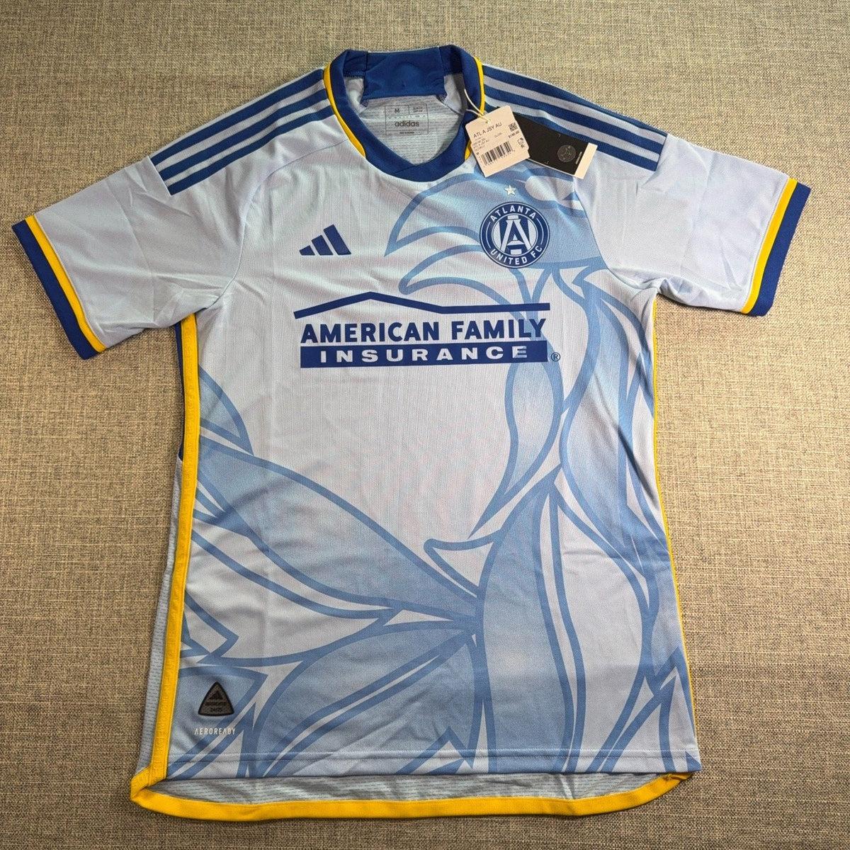 Second Half Supply Co, LLC adidas Atlanta United 2024/25 Resurgens away soccer jersey in light blue with phoenix graphic