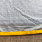 Second Half Supply Co, LLC Atlanta United 2024/25 away jersey hem with yellow trim and Resurgens 1865 text detail