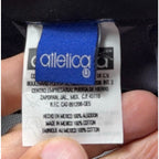 Second Half Supply Co, LLC tag on a vintage Atletica Club Necaxa soccer cap made of 100% cotton in Mexico