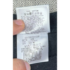 Second Half Supply Co, LLC BAPE t-shirt care label showing 100% cotton material and washing instructions