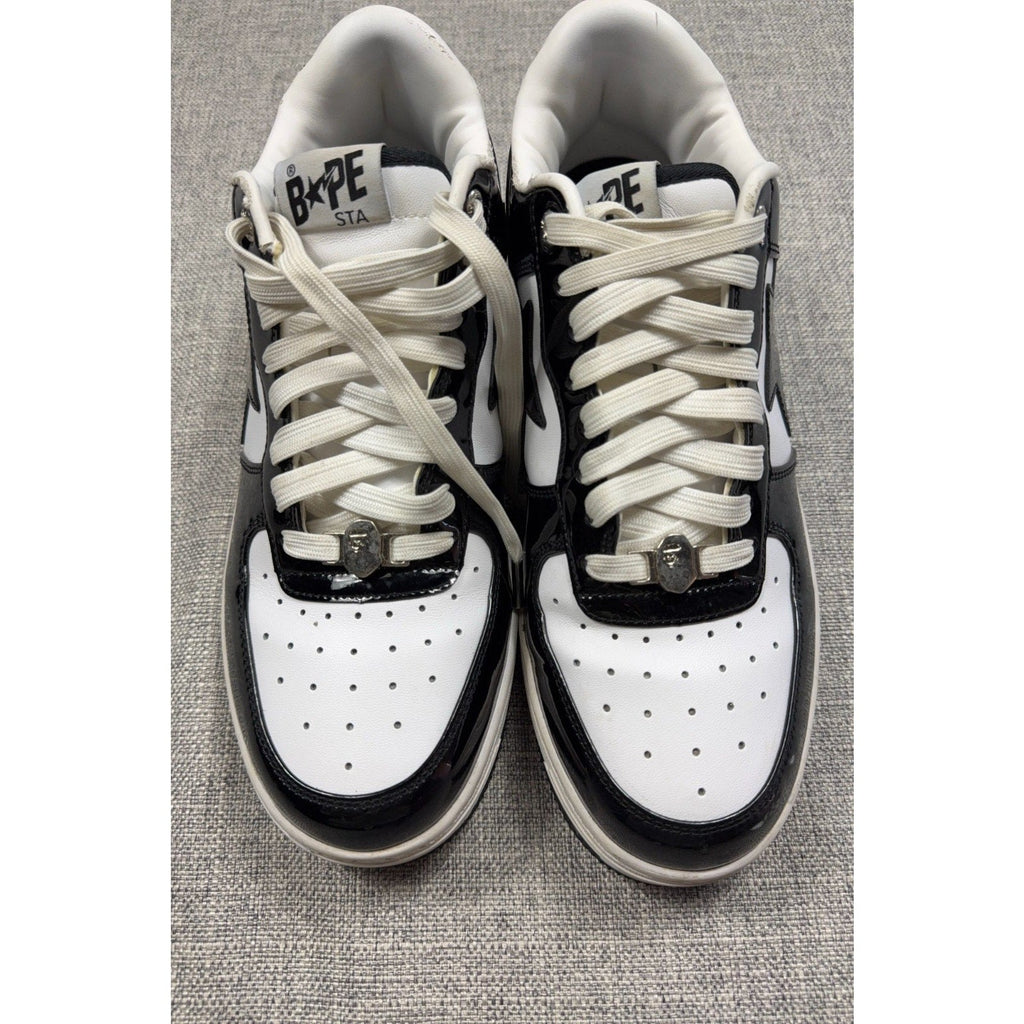 Second Half Supply Co, LLC BAPE STA low-top sneakers in black and white patent leather with silver lace ornaments
