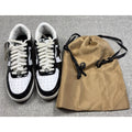 Second Half Supply Co, LLC BAPE STA low-top sneakers in black and white patent leather with dust bag