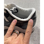 Second Half Supply Co, LLC BAPE STA low sneakers showing peeling and flaking on the black and white ankle collar