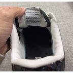 Second Half Supply Co, LLC BAPE STA sneaker interior showing the branded tongue label and white padded ankle collar