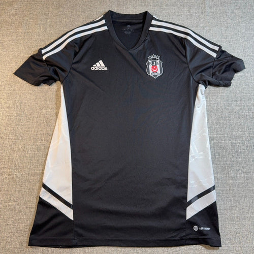 Second Half Supply Co, LLC Adidas Besiktas JK black and white soccer training jersey with V-neck and Aeroready fabric