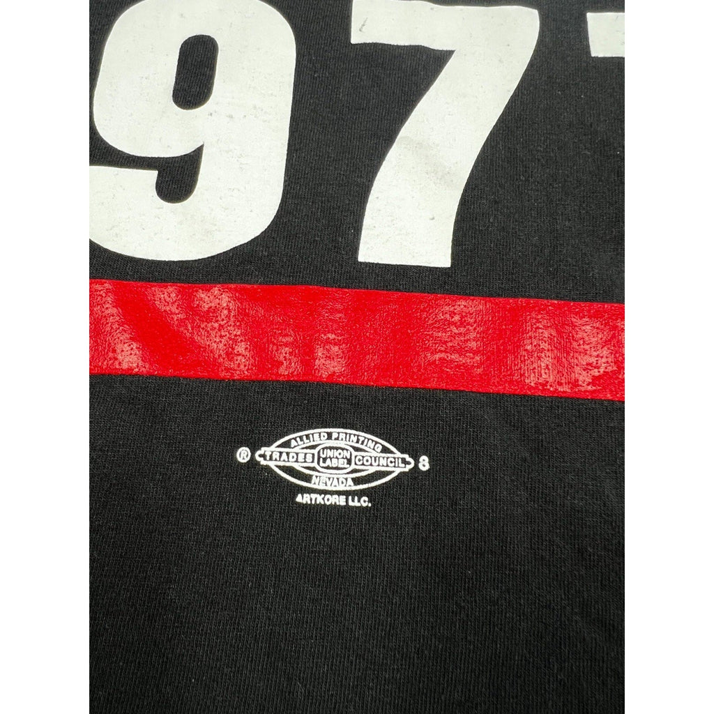 Second Half Supply Co, LLC black heavyweight cotton t-shirt featuring a red and white Carpenters Local 1977 graphic.