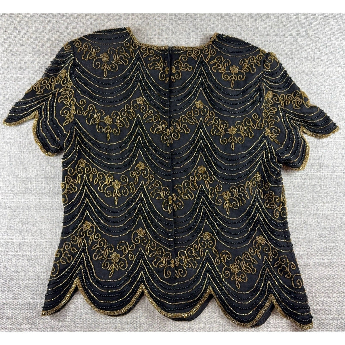 Second Half Supply Co, LLC black silk blouse with intricate gold Art Deco beadwork and scalloped edges