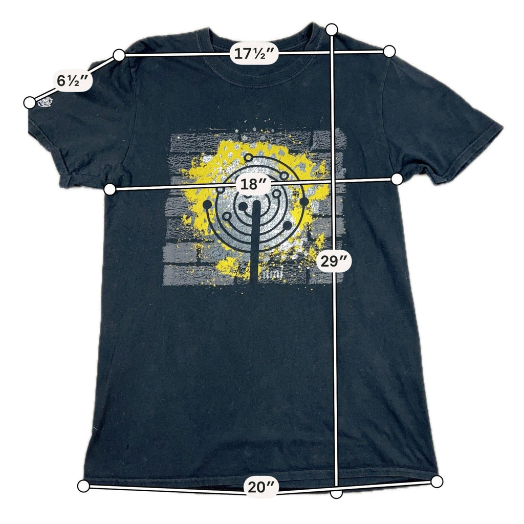 Second Half Supply Co, LLC black crewneck t-shirt with yellow and white brick wall graphic and sleeve key detail.