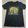Second Half Supply Co, LLC black crewneck t-shirt with a yellow and white brick wall graphic design on the front