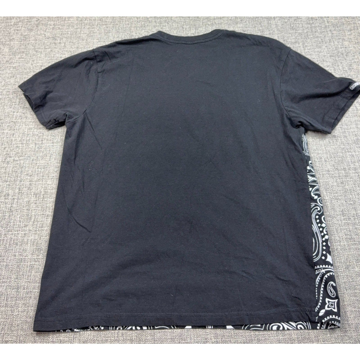 Second Half Supply Co, LLC black cotton graphic t-shirt with white paisley bandana print on the back side