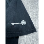 Second Half Supply Co, LLC black t-shirt sleeve featuring a white intricate key graphic print