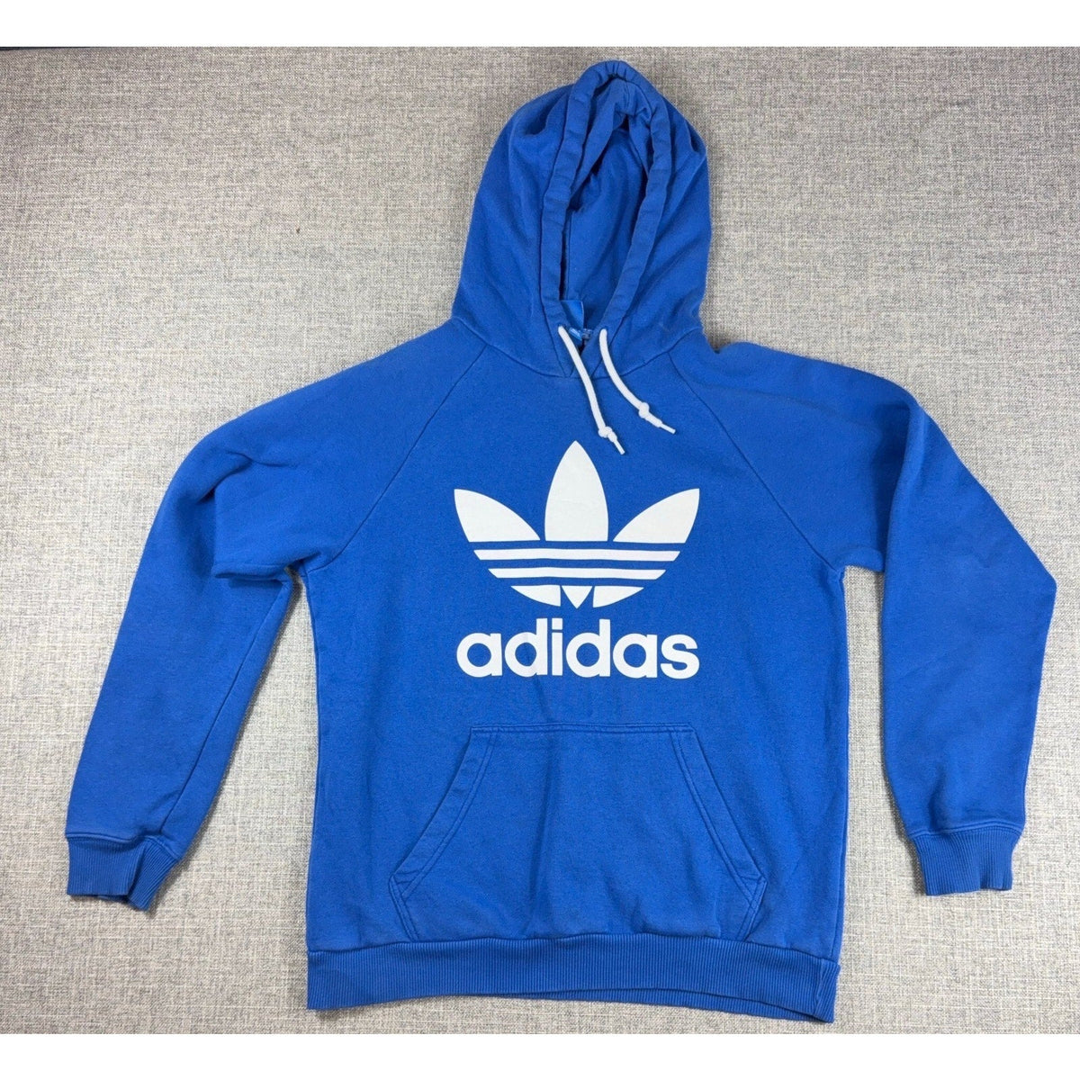 Second Half Supply Co, LLC royal blue Adidas Originals pullover hoodie with large white Trefoil logo and front pocket