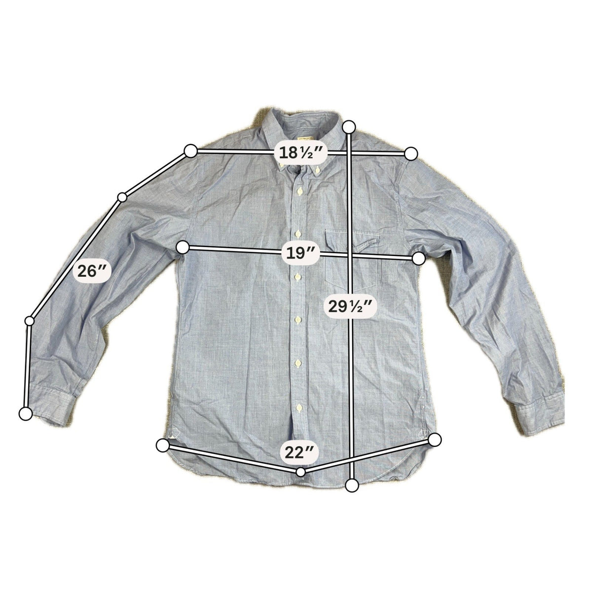 Second Half Supply Co, LLC blue chambray button-down shirt with chest pocket and measurement overlays