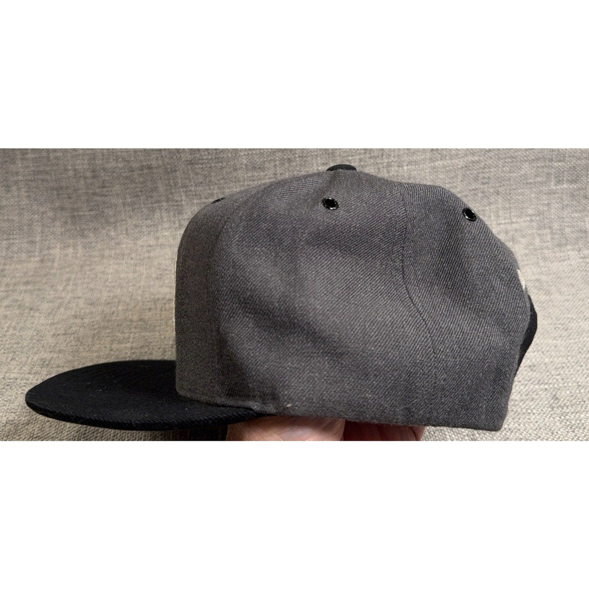 Second Half Supply Co, LLC Brooklyn Nets gray and black snapback hat with flat bill and structured crown side view