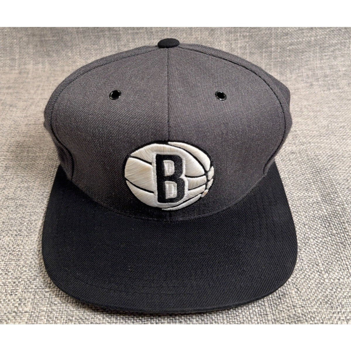 Second Half Supply Co, LLC Brooklyn Nets snapback hat with a gray crown, black flat bill, and embroidered B logo
