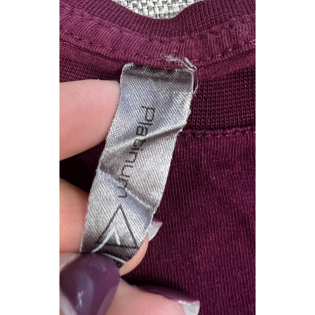 Second Half Supply Co, LLC burgundy cotton t-shirt featuring a Platinum brand neck label