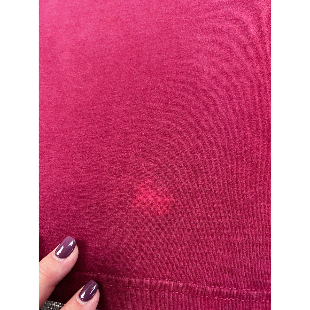 Second Half Supply Co, LLC burgundy cotton graphic tee showing fabric fading and color variation detail