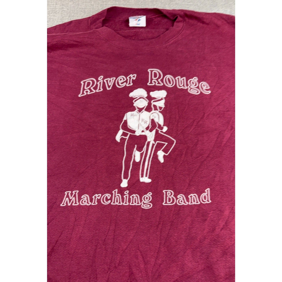Second Half Supply Co, LLC vintage 90s burgundy crewneck sweatshirt with white River Rouge marching band graphic