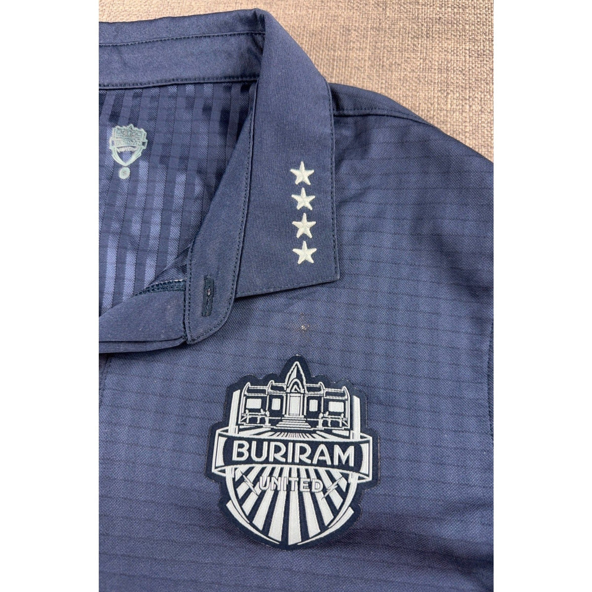Second Half Supply Co, LLC navy blue Buriram United 2017 home soccer jersey with polo collar and embroidered club crest