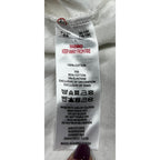Second Half Supply Co, LLC garment care label showing 100% cotton material and washing instructions for a T-shirt