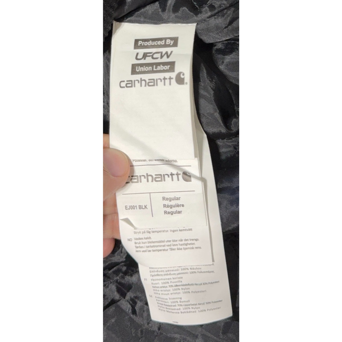 Second Half Supply Co, LLC Carhartt garment care and origin label showing union labor and material composition details