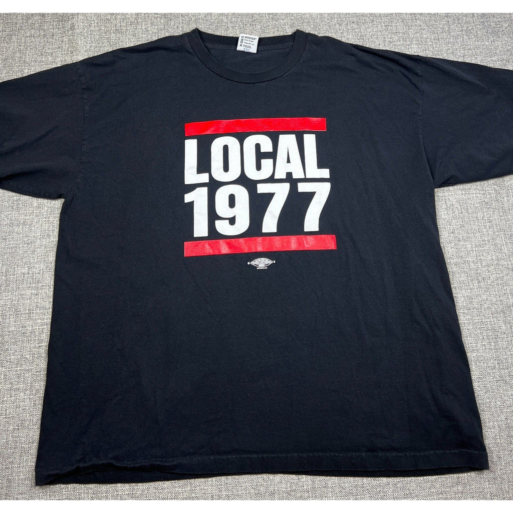 Second Half Supply Co, LLC black heavyweight cotton T-shirt featuring a red and white Carpenters Local 1977 graphic.