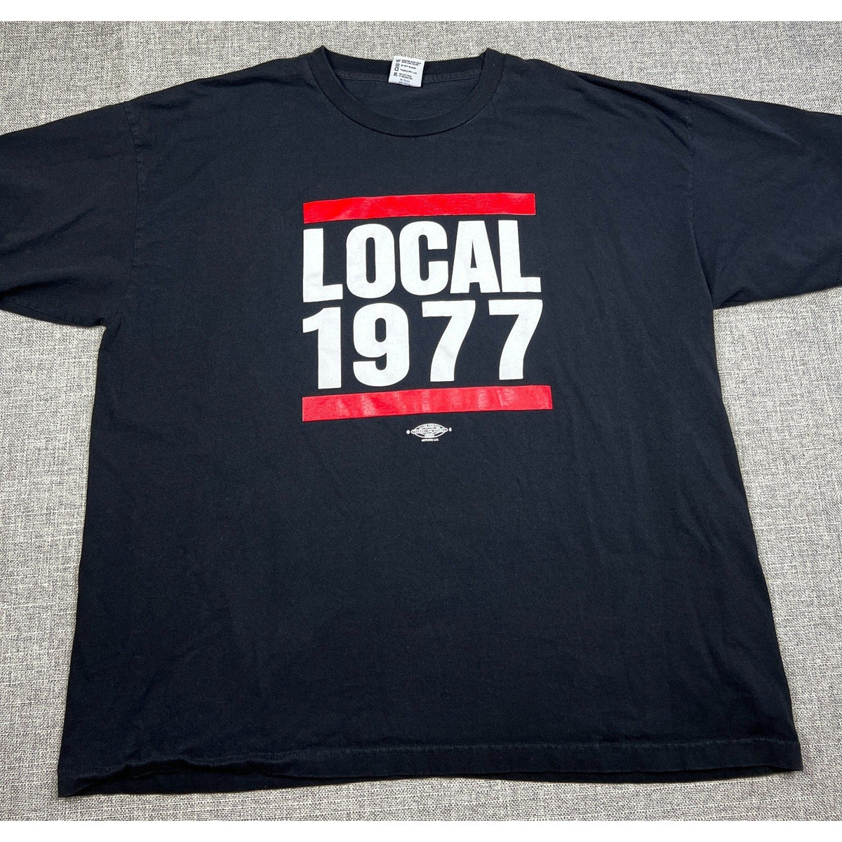 Second Half Supply Co, LLC black heavyweight cotton T-shirt featuring a red and white Carpenters Local 1977 graphic.
