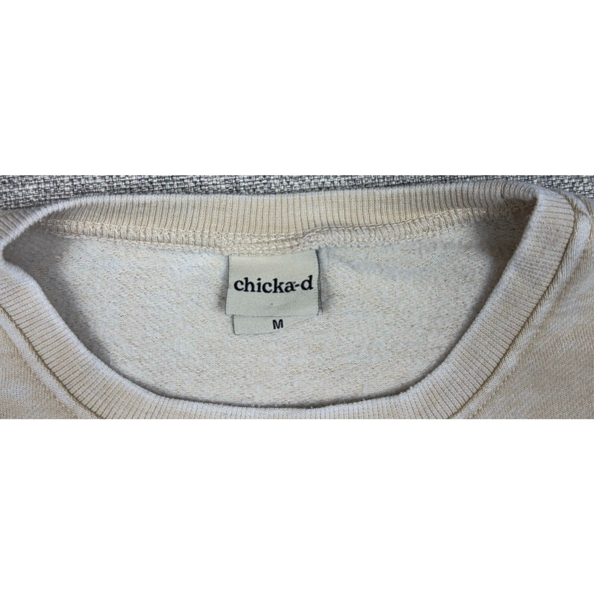 Second Half Supply Co, LLC chicka-d cream crewneck sweatshirt interior neck label showing size medium
