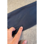 Second Half Supply Co, LLC dark gray Chivas hoodie sleeve showing a small fabric snag and hole detail