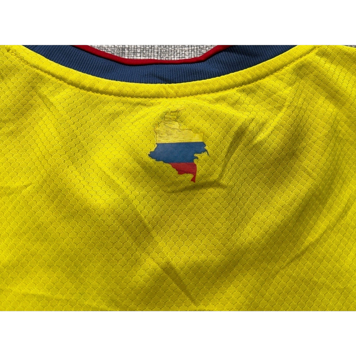 Second Half Supply Co, LLC Adidas Colombia 2020/21 home soccer jersey featuring a yellow map graphic below the collar