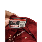 Second Half Supply Co, LLC garnet Colosseum Florida State hat interior label showing 100 percent cotton material