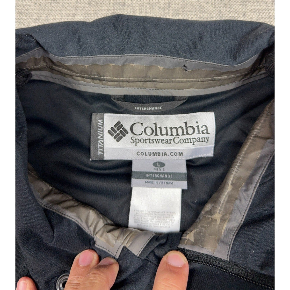 Second Half Supply Co, LLC Columbia Titanium vest interior neck label and size tag in black