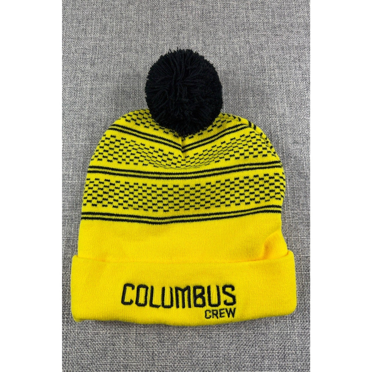 Second Half Supply Co, LLC Columbus Crew yellow and black knit pom beanie with geometric pattern and embroidered cuff