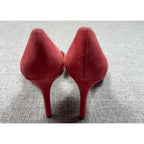 Second Half Supply Co, LLC coral pink suede stiletto pumps viewed from the back showing slim heels