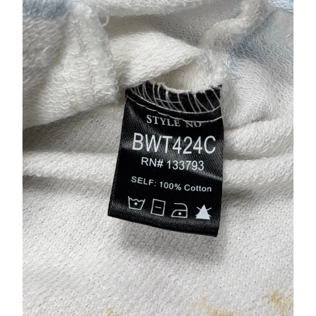 Second Half Supply Co, LLC tag on a white French terry cotton shacket showing style number BWT424C and care symbols.